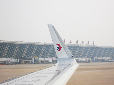 Shanghai, China - 12 4 2017: International airport Pudong Shanghai runway, China. Pudong international airport is a major aviation hub of China.