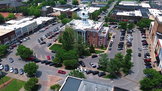 Murfreesboro, United States – July 11, 2023: An aerial view of a small town of Murfreesboro with colorful buildings and clock tower in the center