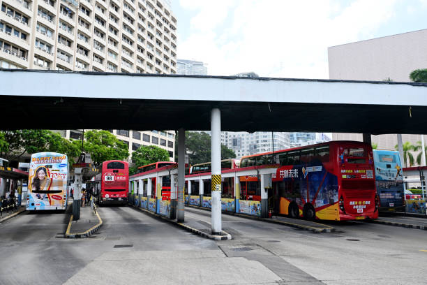 tsim sha tsui star ferry bus terminus en kowloon, hong kong - public transportation winter bus front view fotografías e imágenes de stock