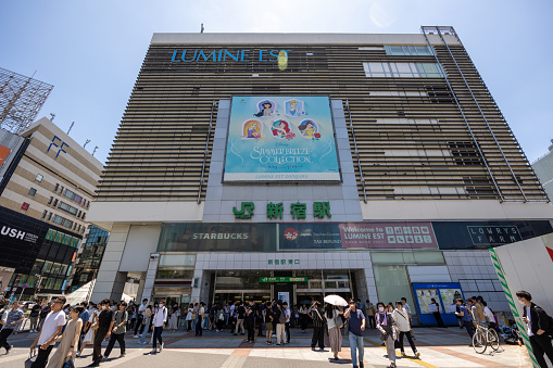 Tokyo, Japan - July 2, 2023 : People at the Shinjuku Station in Tokyo, Japan. It is one of the busiest train station in the world.