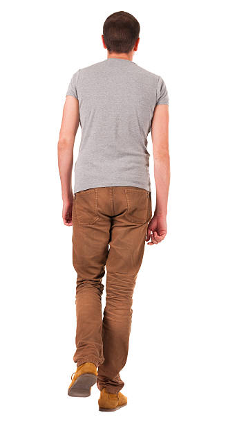 istock Back view of going  handsome man in jeans and shirt. 157359742