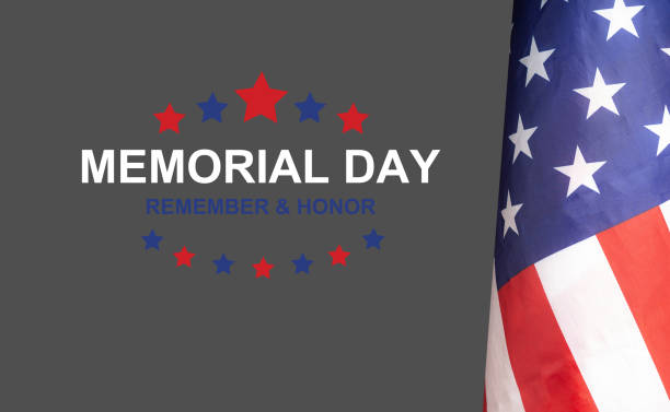 istock The American flag with the text Memorial day, remember and honor 1573616333