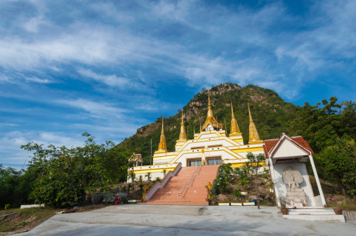 Big pagoda near the mountain in Thailand.