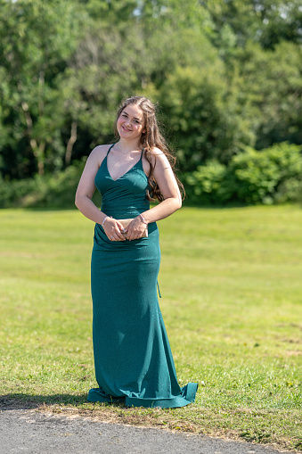 Sixteen year old in girl in prom dress