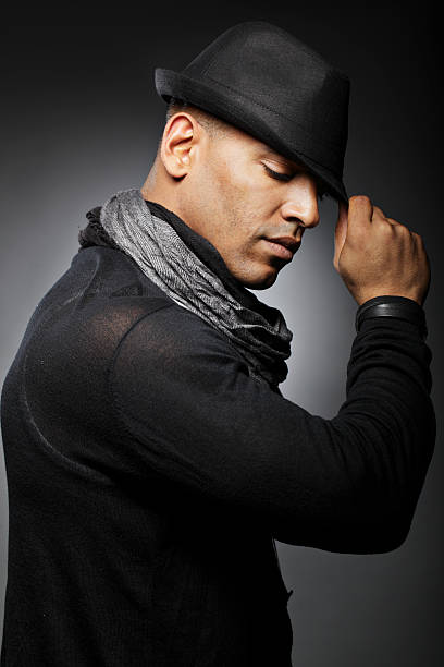 istock Portrait of a Man holding his Hat 157362597
