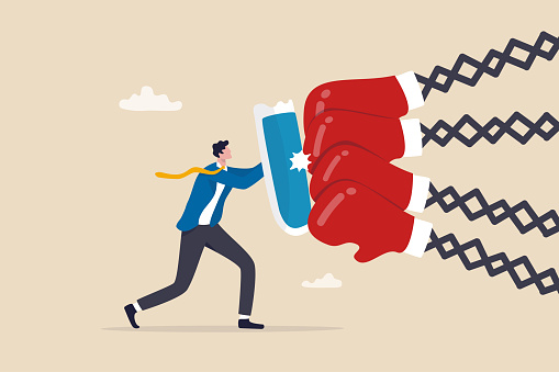Business threat, fight to survive in business competition, resilience or adversity, challenge or survive to win, courage fighter concept, businessman hold shield to fight with multiple fighter punch.