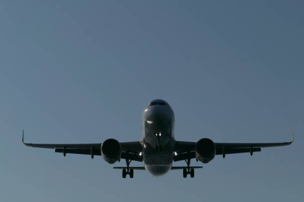 istock plane coming in for landing 1573648381
