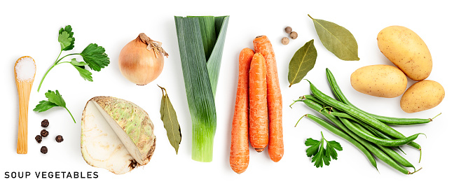 Soup vegetables set. Onion, potato, leek, carrot, celery, bean, salt, bay leaf and pepper isolated on white background. Healthy eating food concept. Creative layout. Flat lay, top view