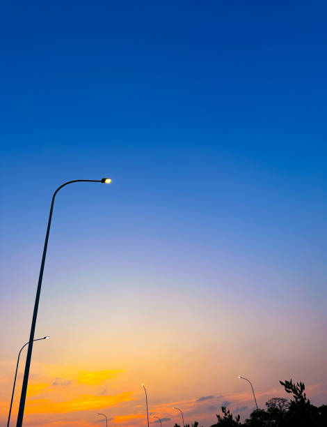 istock pole street lighting silhouette 1573695624
