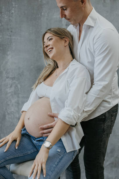 istock Happy couple expecting baby 1573696146