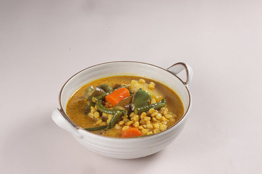 Dalca Sayur or Vegetables Dalca is a Stewed Vegetables Curry with Lentils, Famously Served with Briyani or Tomato Rice.