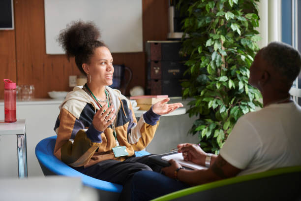 istock teenage student with counsellor 1573713203