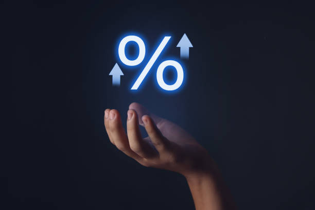 istock percentage symbol in hand 1573721073
