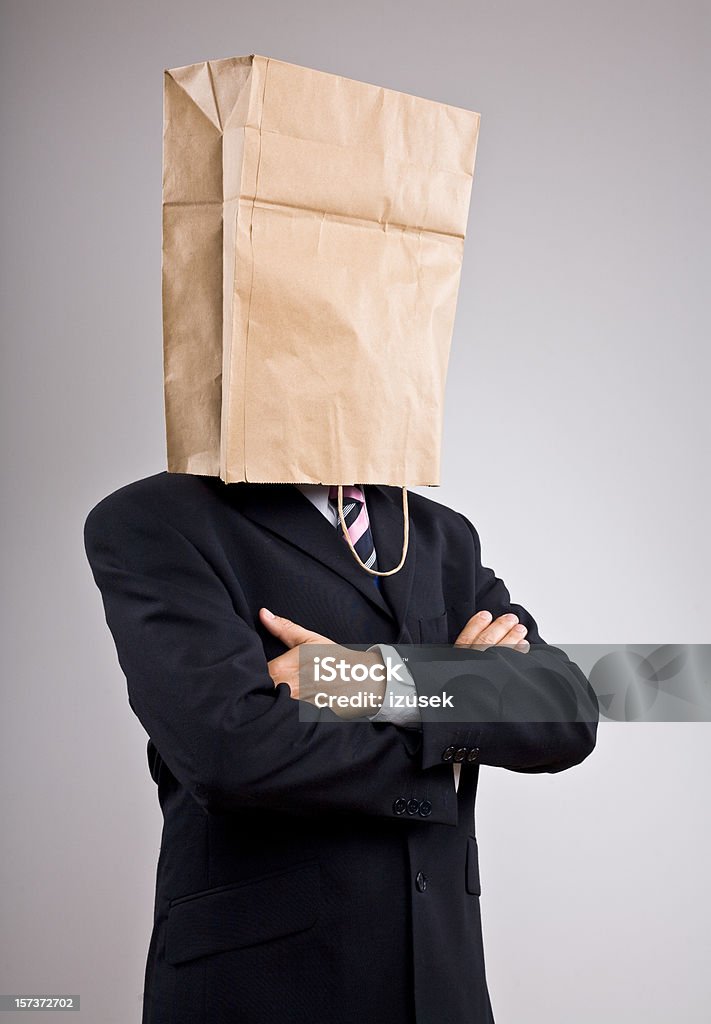 Homme d'affaires avec sac en papier sur sa tête - Photo de Adulte libre de droits
