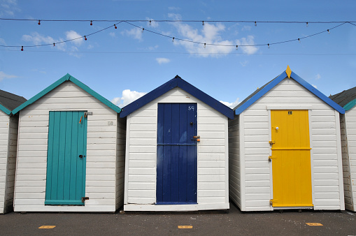 If you do not want the string of lamps you can easily remove them. These colorful huts you find everywhere round the coast of South England.