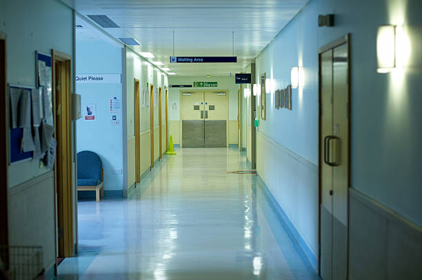Hospital corridor blue walls stock photo