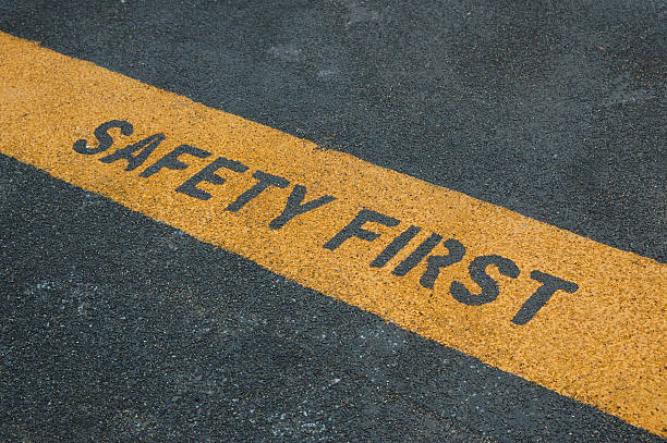 Please stand behide the yellow line! Please stand behide the yellow line! safety stock pictures, royalty-free photos & images