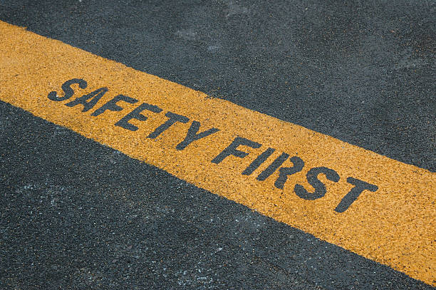 Please stand behide the yellow line! Please stand behide the yellow line! Safety Considerations stock pictures, royalty-free photos & images