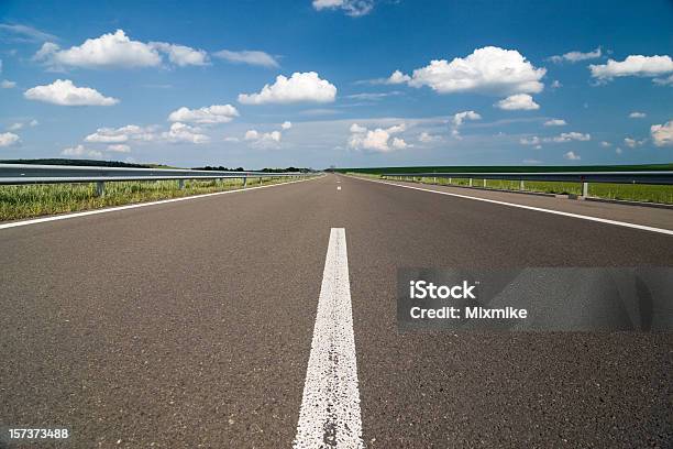 Empty Highway Stock Photo - Download Image Now - Asphalt, Blue, Cloud - Sky