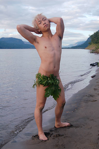 Island Boy at Sunset  loin cloth stock pictures, royalty-free photos & images