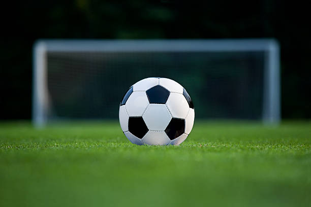 Traditional soccer ball, isolated on white background. Close up.