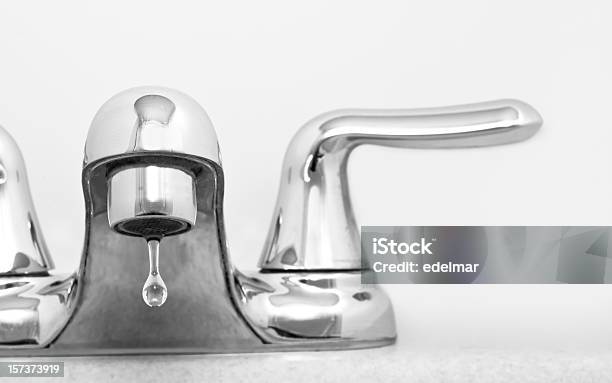 Close Up Of Stainless Steel Faucet Dripping Water Stock Photo - Download Image Now - Faucet, Leaking, Drop