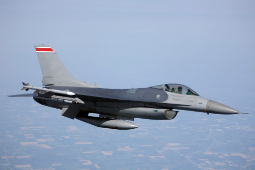 An F-16 Fighter performing a training mission. 