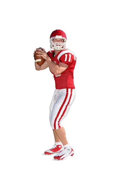 Quarterback dropping back to pass. Isolated on white with drop shadow and clipping path.