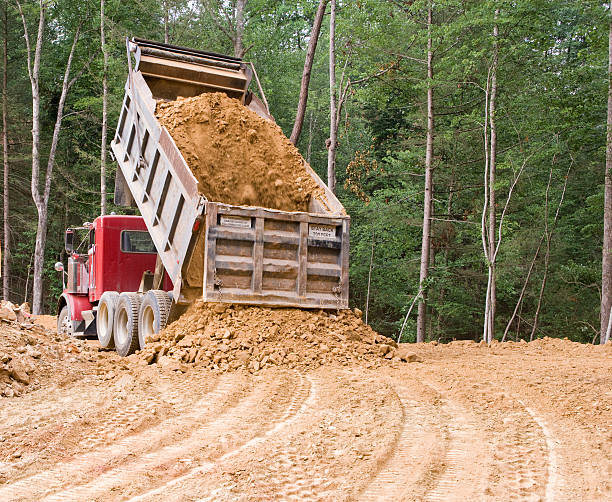 Dump truck dumping  dump truck photos stock pictures, royalty-free photos & images
