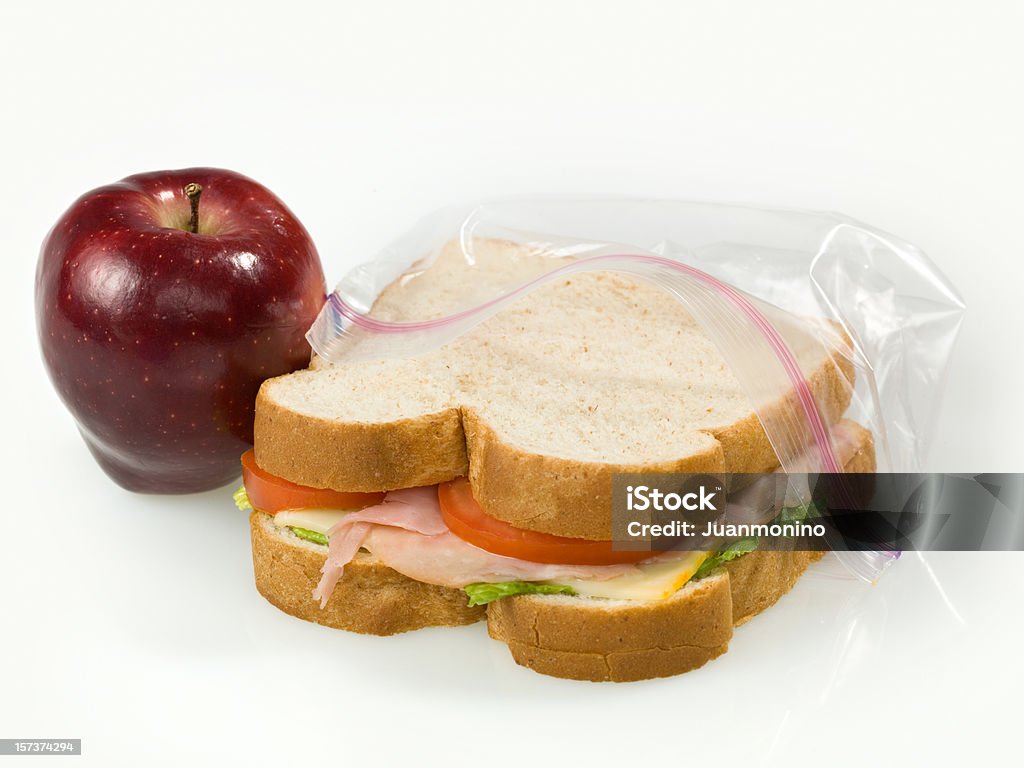 Una scuola pranzo, Apple e un panino - Foto stock royalty-free di Imballare