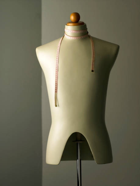 istock male  mannequin with tape measure 1573748933