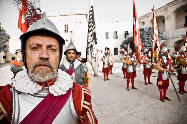 Portrait Series Knight Hospitaller Malta VI Knight hospitaller in Fort Saint Elmo. Military re-enactment at Fort Saint Elmo, Portrait Series. Valetta, Malta. Canon 1Ds Mark III knights of malta stock pictures, royalty-free photos & images