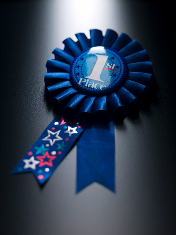 Number one medal on a blue ribbon