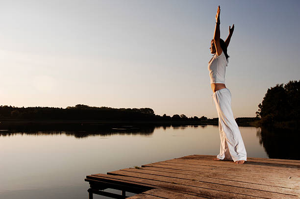 istock woman at the lake serie 157375271