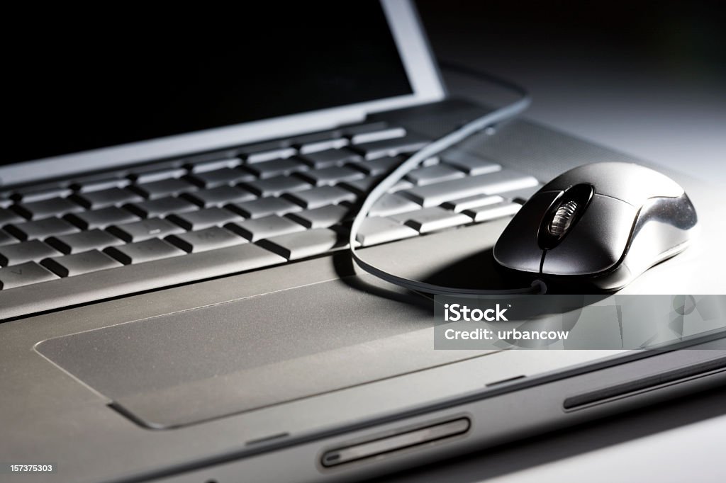 Laptop und Maus - Lizenzfrei Neu Stock-Foto