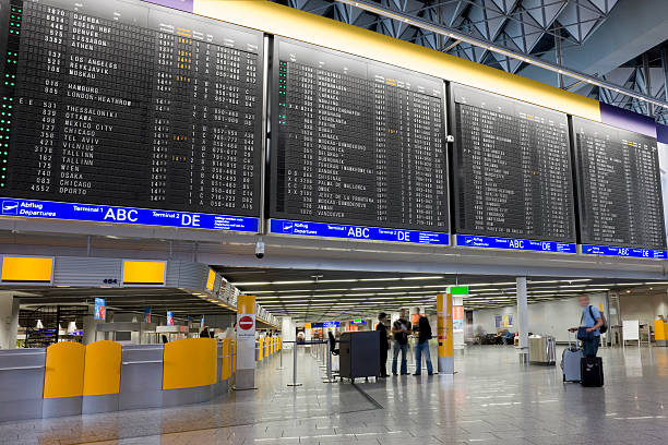 istock Airport with arrival departure board 157375733