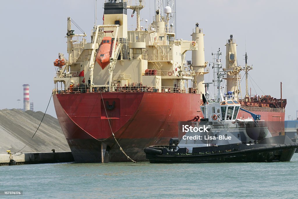 Cargo Ship and Tugboat  Nautical Vessel Stock Photo