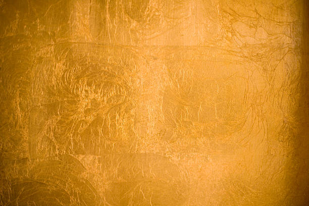 A shiny gold textured background stock photo