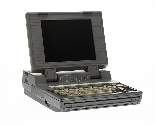 istock Grey vintage laptop studio shot isolated on white 157376531