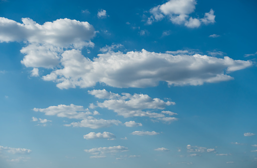 Panorama blue sky with cumulus clouds. High resolution.