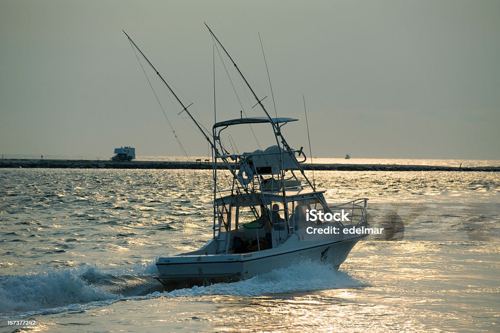 Sport Fishing Boat Heads Out to Sea  Activity Stock Photo