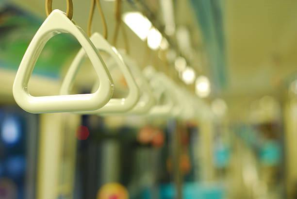 istock Handles in a straight line in a subway 157377297