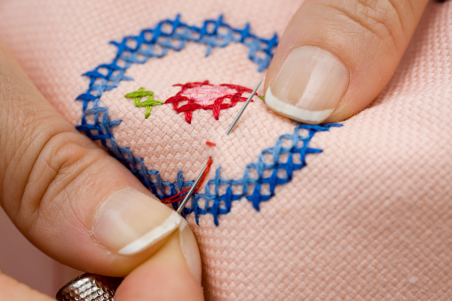 detail shot during fabric sewing