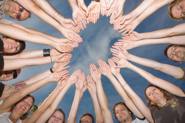 istock Group of People with hands in a circle 157378141