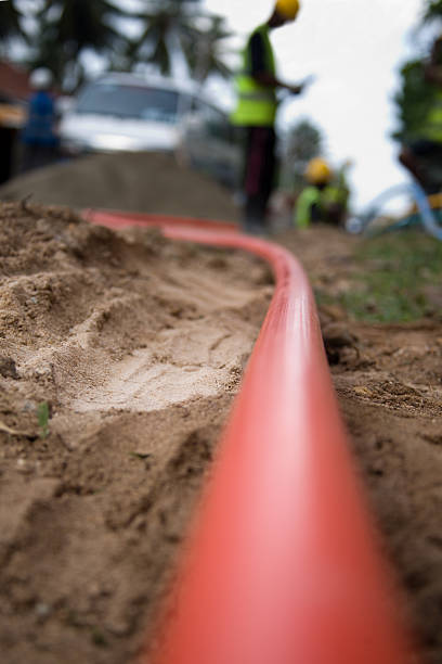 cable pipe being laid stock photo