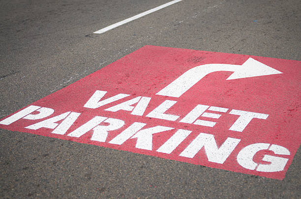 Valet Parking Sign painted on the road surface. valet parking stock pictures, royalty-free photos & images