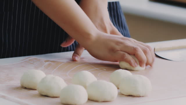 Woman hands shaping sweet bread