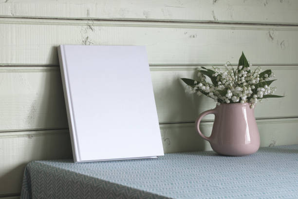 istock Mockup book. An album with an empty white cover. 1573783271