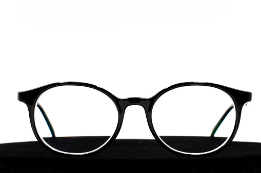 Eyeglasses with black frame isolated on white background for applying on a portrait.