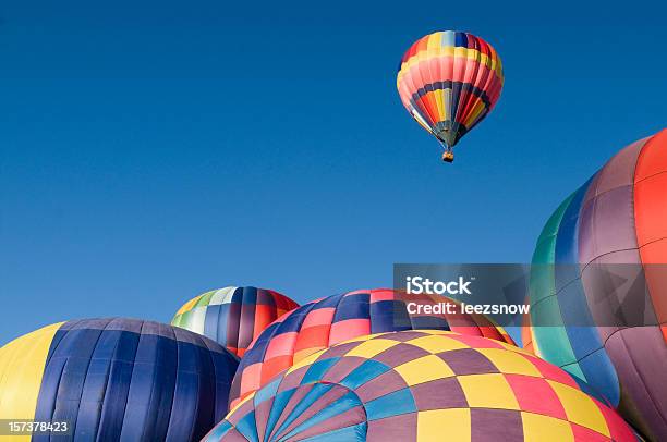 Colorful Hot Air Balloon Rising With Copy Space Stock Photo - Download Image Now - Hot Air Balloon, Moving Up, Inflating